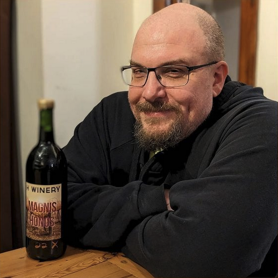 Me at the wine school in Philadelphia posing with a bottle of the wine we made in Advanced Winemaking